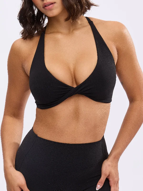 Compression tank sports bra – Combination of a tank top and sports bra, providing full coverage and support for the upper body.Glow Sports Bra - Onyx Black