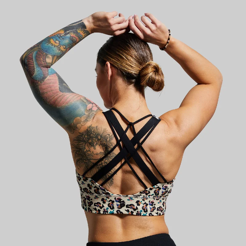 Compression sports bra – Sports bra that compresses the chest for a more secure fit and reduced bounce during high-impact activities.Ignite Sports Bra (Safari)