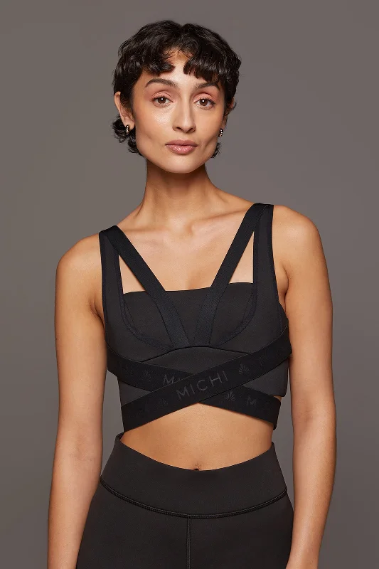 Compression tank sports bra – Combination of a tank top and sports bra, providing full coverage and support for the upper body.Le Mans Longline Bra