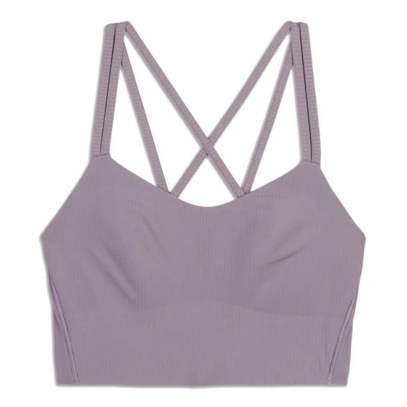 Racerback sports bra – Sports bra with a back design that features straps that meet in a "V" or "Y" shape, offering better shoulder mobility.Like A Cloud Ribbed Longline Bra - Resale