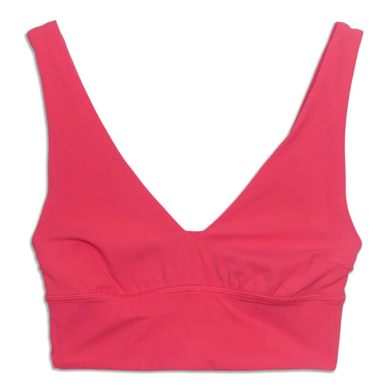 Racerback sports bra – Sports bra with a back design that features straps that meet in a "V" or "Y" shape, offering better shoulder mobility.lululemon Align™ V-Neck Bra - Resale