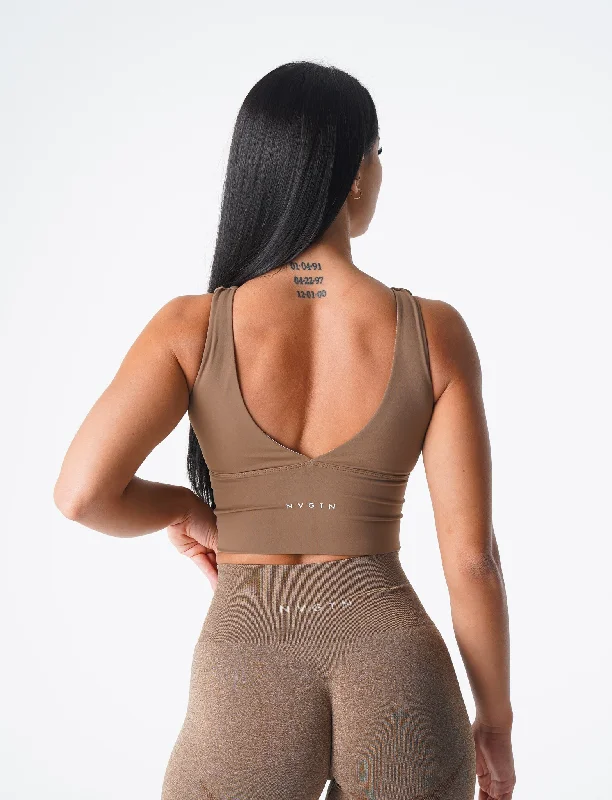 Back-closure sports bra – Sports bra with a hook-and-eye closure at the back for adjustable fit and ease of wear.Mocha Essence Bra