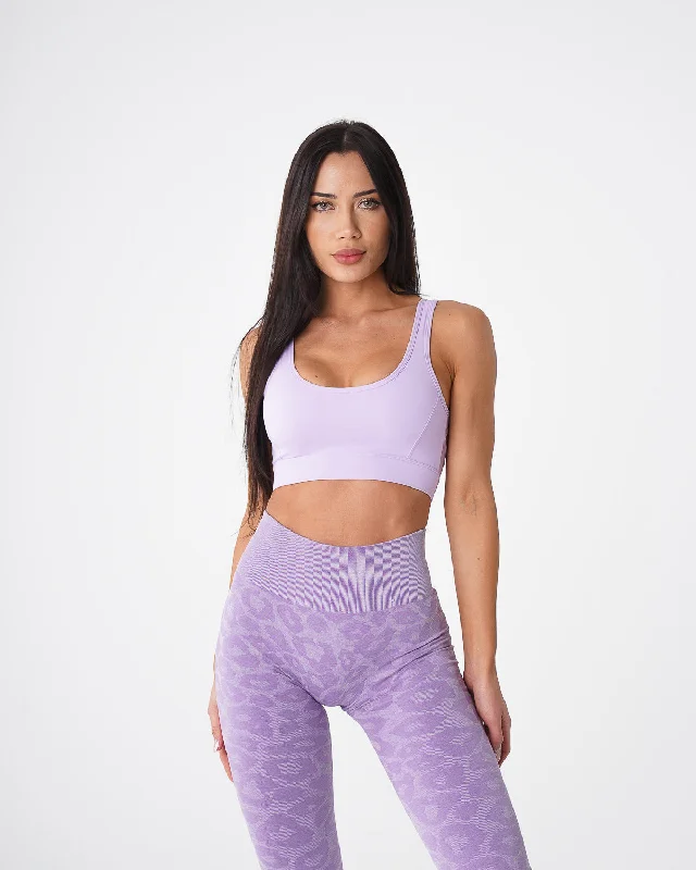 Compression tank sports bra – Combination of a tank top and sports bra, providing full coverage and support for the upper body.Monaco Purple Allure Bra