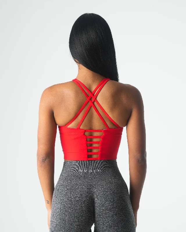 Back-closure sports bra – Sports bra with a hook-and-eye closure at the back for adjustable fit and ease of wear.Scarlet Matrix Bra Top