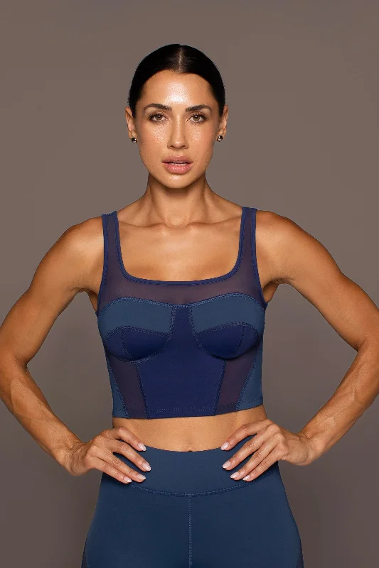 Supportive sports bra – Sports bra specifically designed to provide strong support, often for larger busts or high-impact activities.Theia Bustier