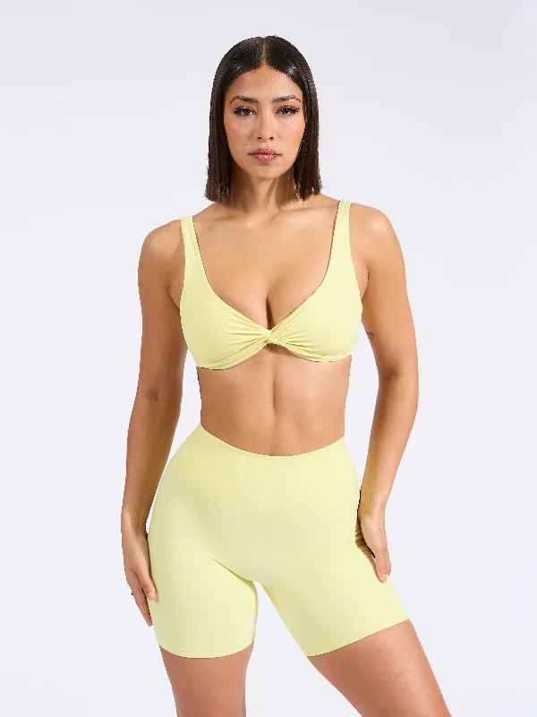 Breathable sports bra – Sports bra made from lightweight, moisture-wicking fabrics to keep the body cool and dry.Twisted Sports Bra - Afterglow Yellow