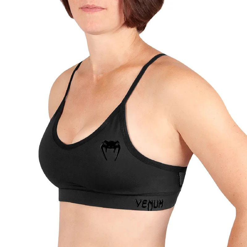 Criss-cross strap sports bra – Sports bra with straps that cross over at the back, providing extra support and a stylish look.Venum Tecmo Sport Bra - For Women - Black/Black