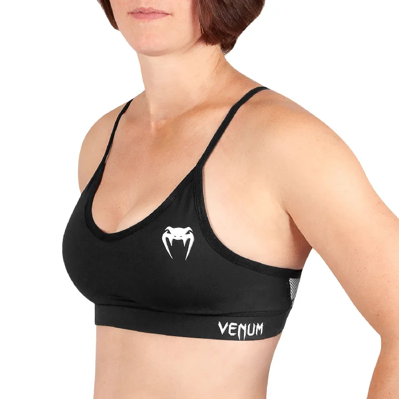 Crossover sports bra – Sports bra with a crossed strap design at the back, offering a stylish and supportive fit.Venum Tecmo Sport Bra - For Women - Black/White