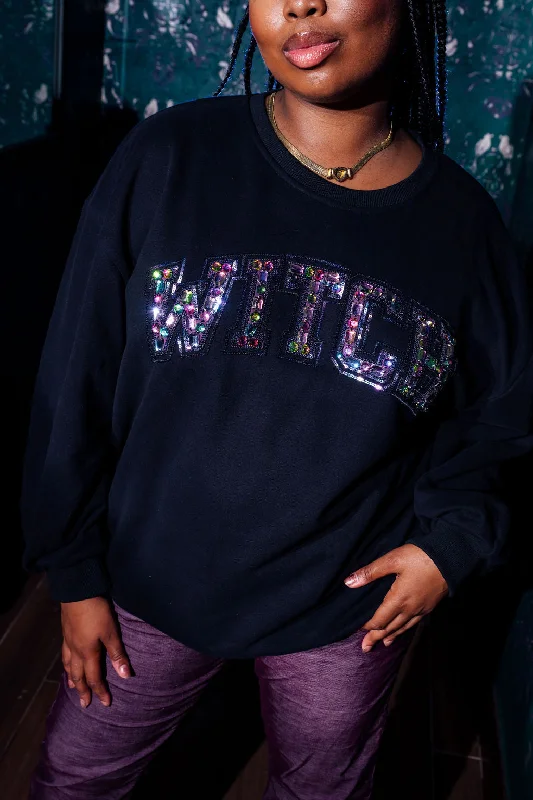 V-neck sweatshirt – Sweatshirt with a V-shaped neckline, less common than crew or hooded necksBlack Jeweled 'Witch' Sweatshirt