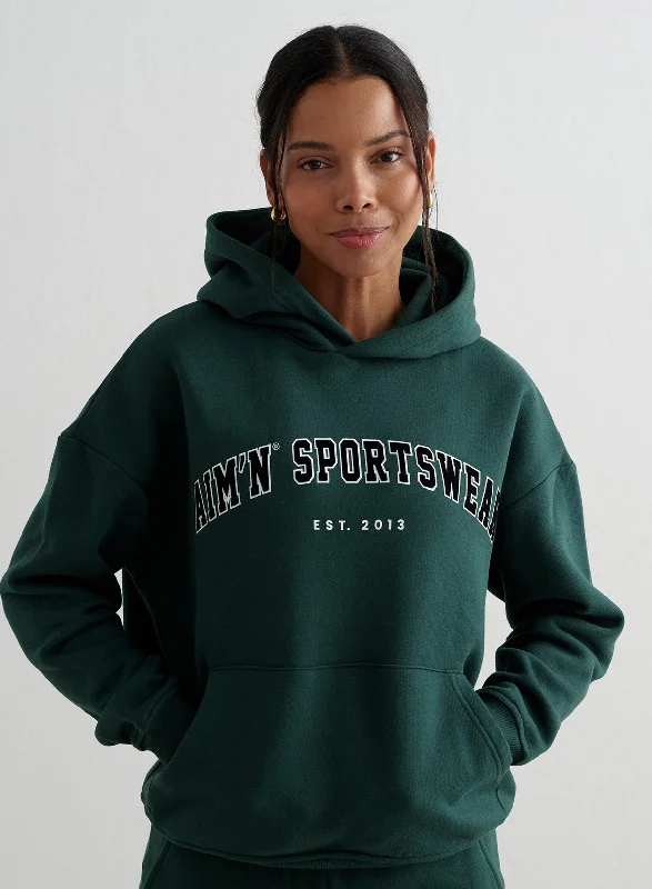 Tie-dye hoodie – Hoodie with a colorful, patterned design created through tie-dye techniquesDeep Emerald Varsity Sweat Hood