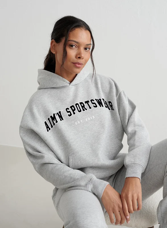 Sherpa-lined hoodie – Hoodie lined with faux sheepskin (Sherpa) for extra warmthGrey Melange Varsity Sweat Hood