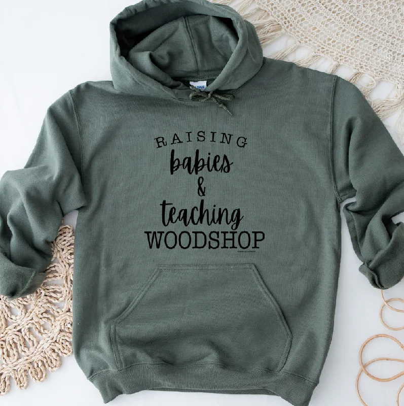 V-neck sweatshirt – Sweatshirt with a V-shaped neckline, less common than crew or hooded necksRaising Babies & Teaching Woodshop Hoodie (S-3XL) Unisex - Multiple Colors!