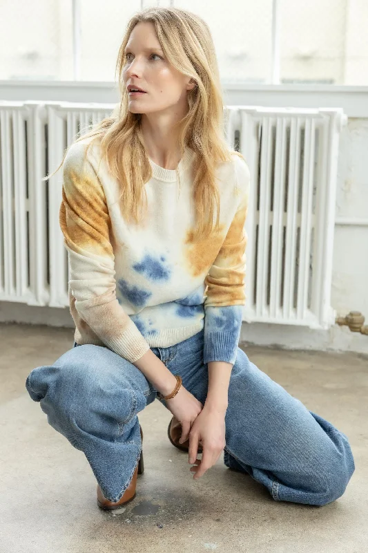 Raglan sleeve – Diagonal sleeve seams that extend to the necklineTie Dyed Crewneck Sweater